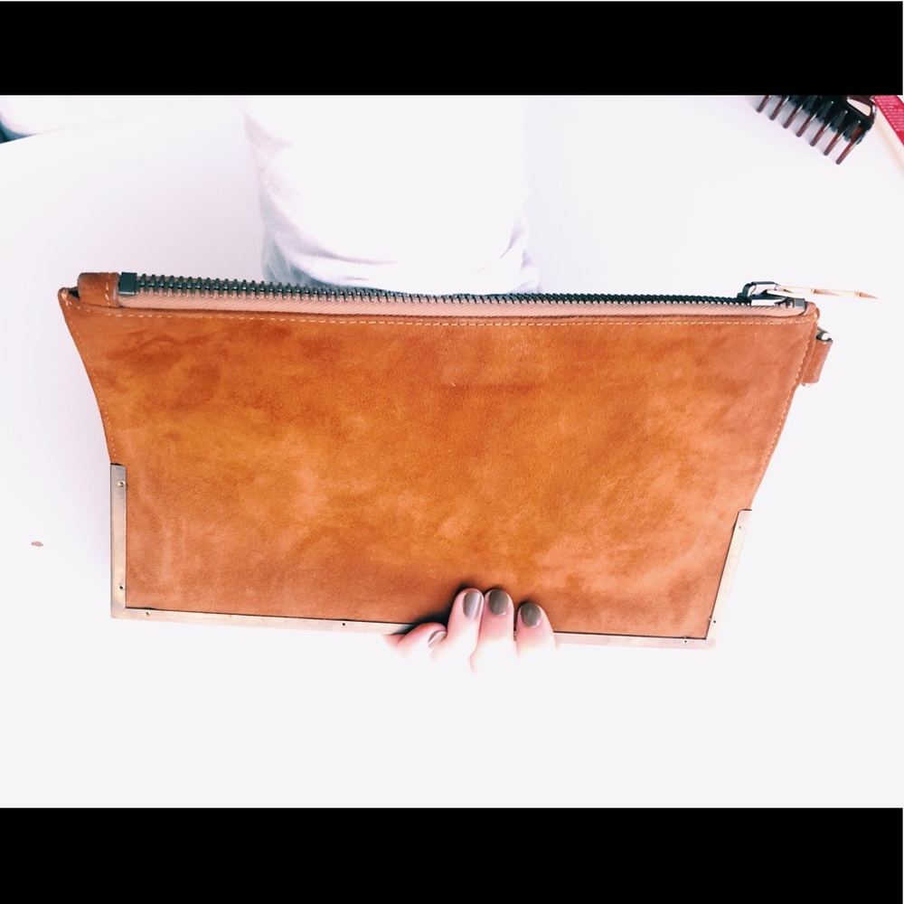 Damir Doma clutch